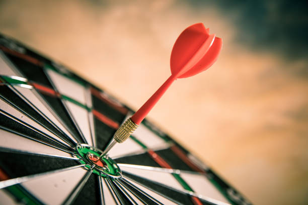 istock Dart in bull's eye 680004774