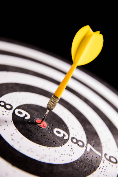 istock Dart in bull's eye 680006926