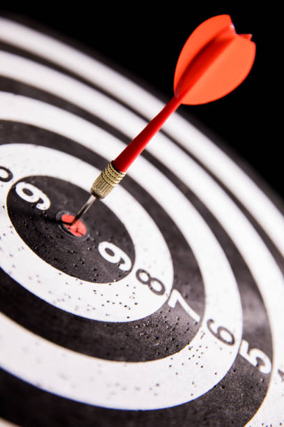 istock Dart in center of target 680007930