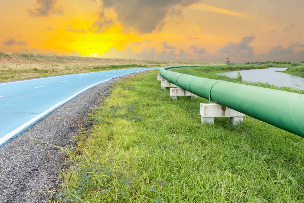 istock Raw water pipeline and distribution parallel of the road. 680008874