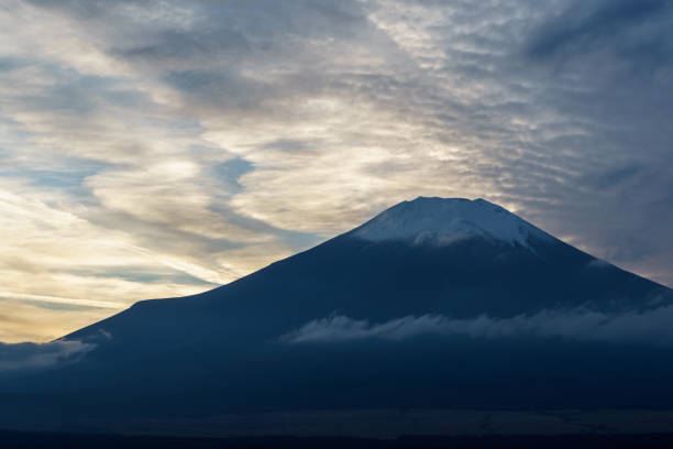 Mt. Fuji and cloudy sky at sunset Photograph from Lake Yamanaka, Yamanashi: Mt. Fuji and cloudy sky and evening view
 cirrocumulus stock pictures, royalty-free photos & images