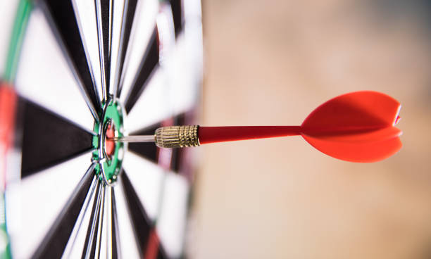 istock Dart in center of target 680019622
