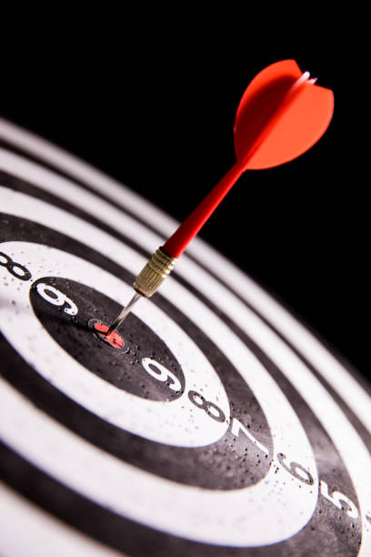istock Dart in center of target 680019774
