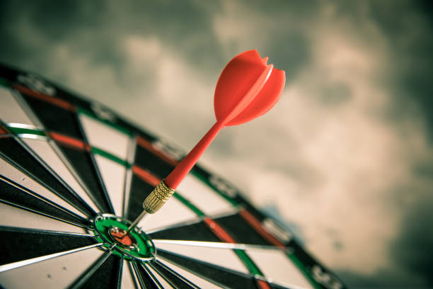 istock Dart in center of target 680022096