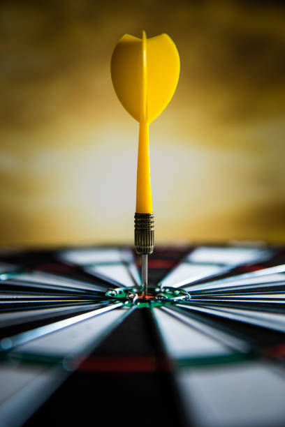istock dart in dartboard bullseye 680022258