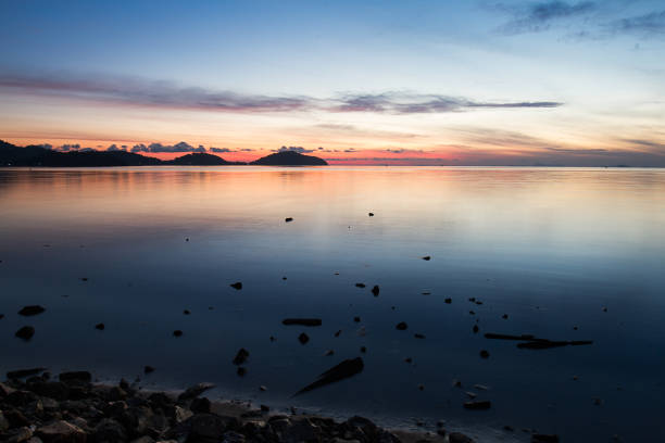 istock Beautiful sunrise at the beach, Saphan Hin,Phuket,Thailand 680022472