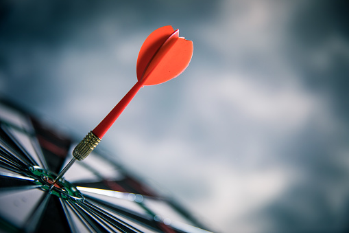 Dartsdart in dartboard bullseye