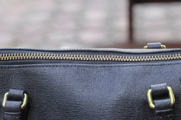 istock Close up zipper of black leather bag 680023752
