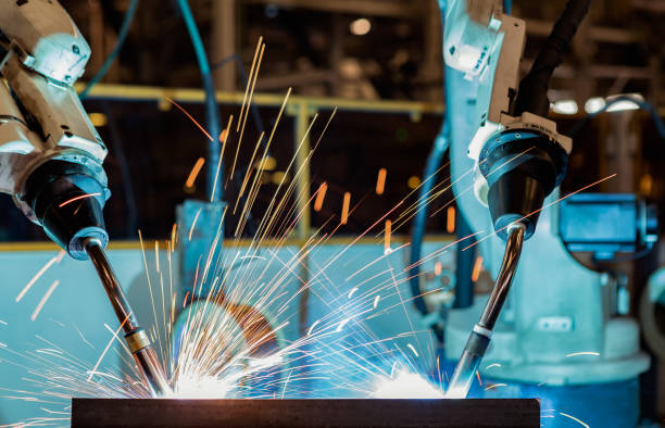 istock robot welding part in automotive industrial 680031930