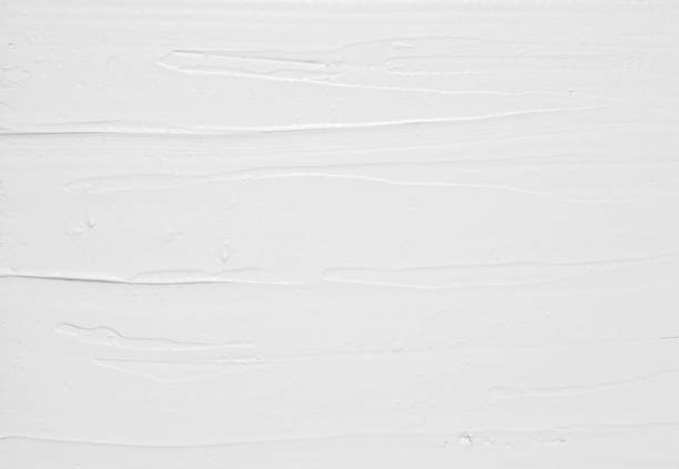 White sweet cream spread structure, background White sweet cream spread structure, abstract culinary background with free space for text. Backdrop of stucco wall, repair and construction. decorating a cake photos stock pictures, royalty-free photos & images