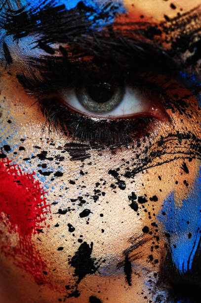 Colorful Paint Splashes on Face of beauty Model