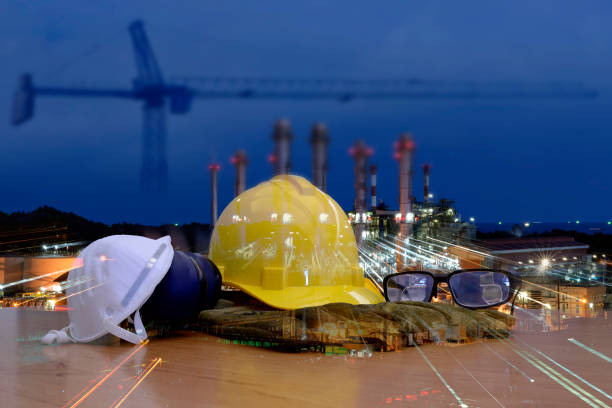 istock Double exposure of Standard construction safety and construction site background. 680045284