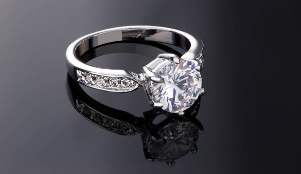 Wedding Ring Brilliant Diamond Ring on black background diamond ring stock pictures, royalty-free photos & images