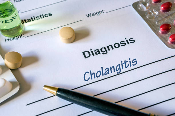istock Diagnosis cholangitis written in the diagnostic form and pills 680051564