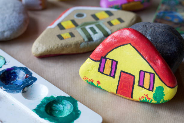 istock homemade stone painted as yellow home 680068880