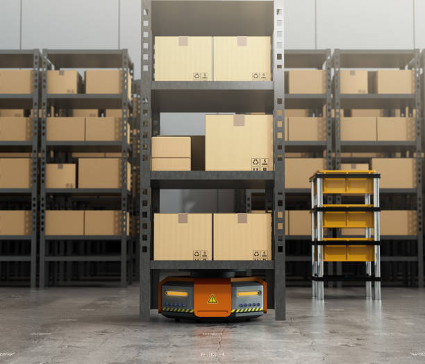 istock Orange robots carrying pallets with goods in modern warehouse 680071536