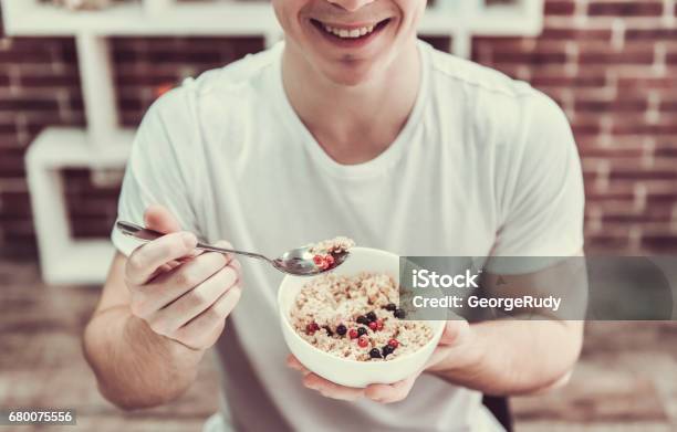 Guy With Healthy Food Stock Photo - Download Image Now - Eating, Men, Dietary Fiber