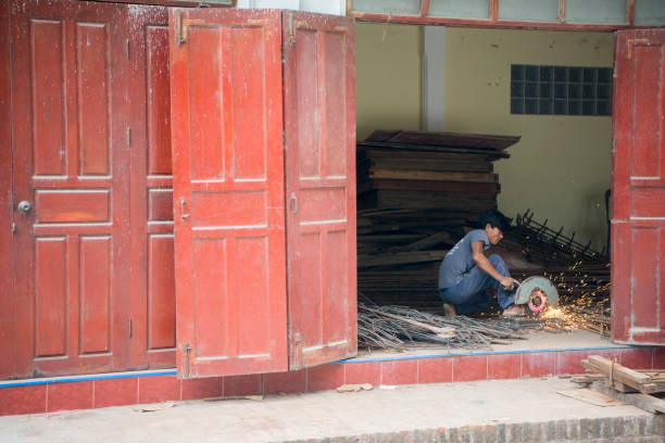 a house renovation work in the town of Luang Prabang in the north of Laos in Southeastasia.