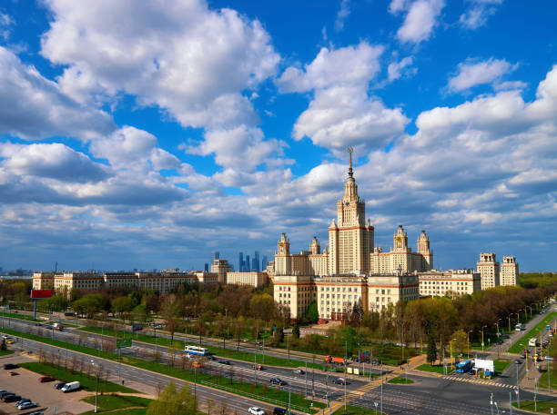 istock Sunny spring campus of Lomonosov Moscow State University under blue cloudy sky 680079022