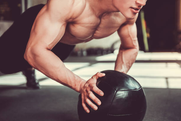 istock Young sportsman working out 680100952