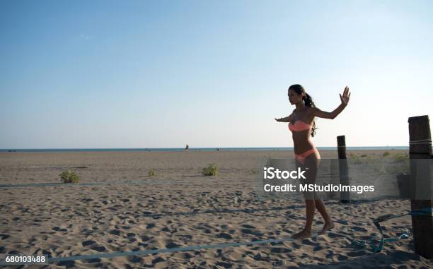 Balancing On Slackline Stock Photo - Download Image Now - Montenegro, Slacklining, 20-29 Years