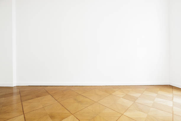 istock white wall background and wooden floor - new home 680104506
