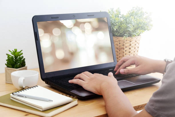 istock Hand typing laptop with blank blur background on screen, for mock up, technology, lifestyle, digital marketing, template, online business, online learning 680106160