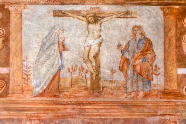 istock The Crucifixion in an ancient fresco 680111832