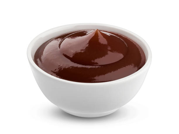 Grill sauce on white background Grill sauce in bowl isolated on white background with clipping path barbeque sauce photos stock pictures, royalty-free photos & images