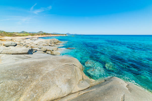istock Grey rocks and blue sea in Sant'Elmo beach 680120978