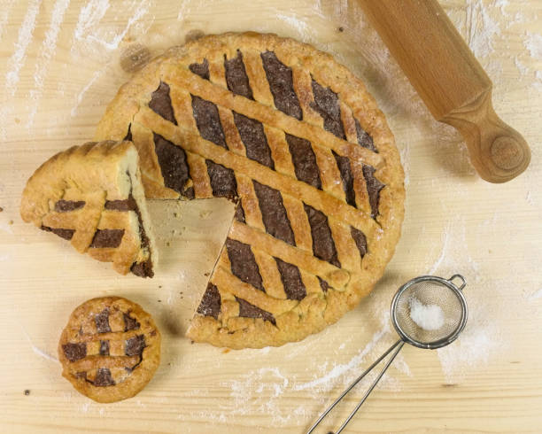 istock Tart with chocolate cream on wooden background - top view 680120984