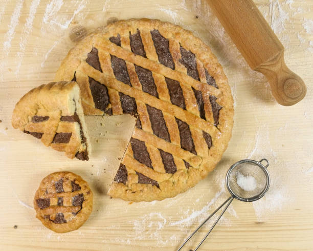 istock Tart with chocolate cream on wooden background - top view 680122230