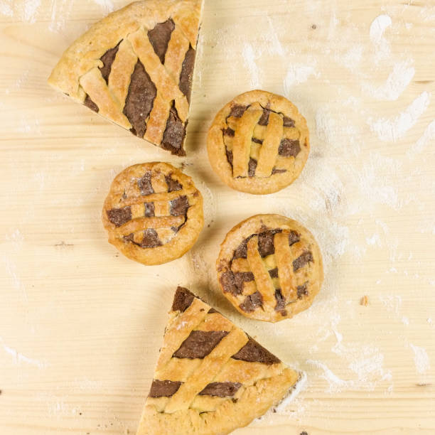 istock Tart with chocolate cream on wooden background - top view 680122468