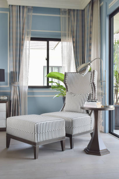 istock Striped high back armchair with ottoman in light blue classic bedroom 680134140