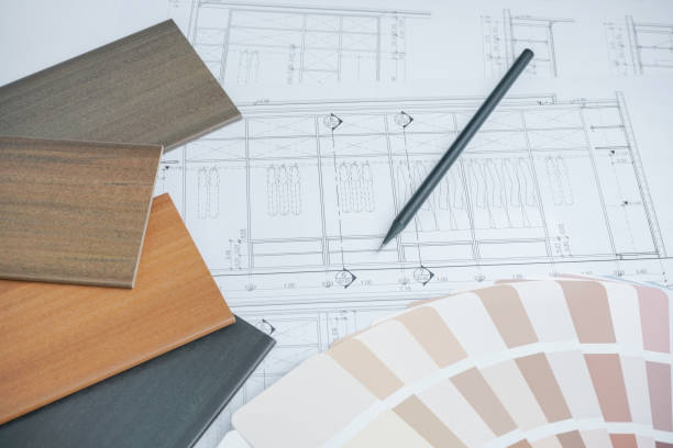 color and material samples on architectural drawings of the modern house stock photo
