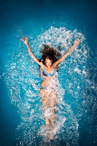 istock Swimming girl. 680135200