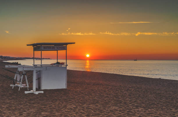 istock Coast in Spain Costa Brava, gazebo for surfers at sunset 680138464