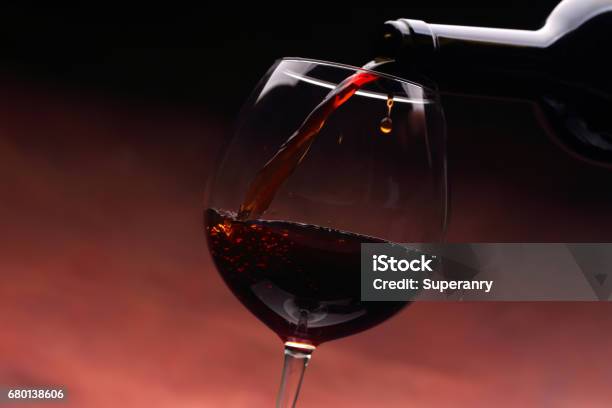 Pouring Red Wine Into A Glass Stock Photo - Download Image Now - Burgundy - France, Drink, Drinking Glass