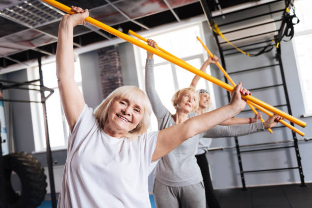 istock Sporty aged women holding gymnastic sticks 680141478