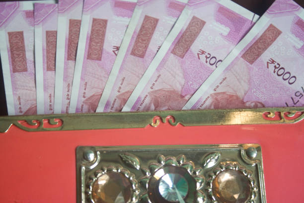 istock ladies wallet indian money 680145036
