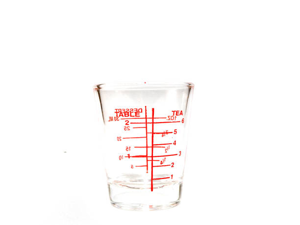 istock The glass cookware measure cup with red label on the white isolated background 680149192