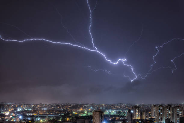 istock Flying Lightning in a stormy night in the city 680159334