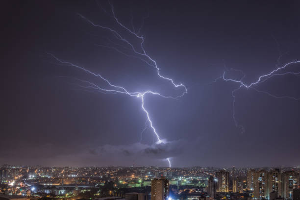 istock Illuminated Sky in a stormy night in the city 680161458