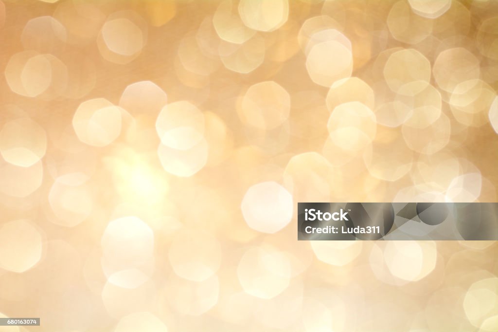 Gold Bokeh Background. The background with boke. Gold Bokeh Background. The background with boke. Abstract texture. Color circles. Blurred Gold - Metal Stock Photo