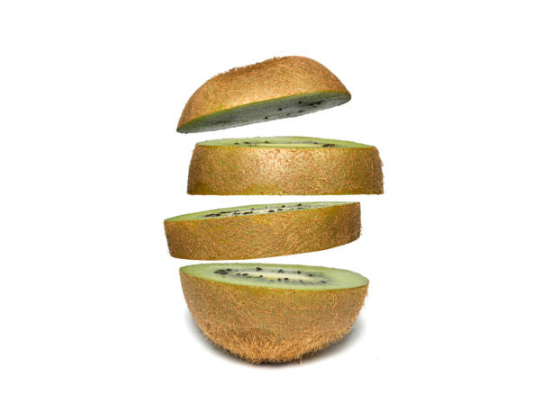 istock Sliced kiwi isolated on white background. Flying fruit floating in the air. 680165180