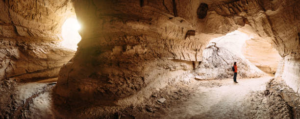 istock traveler exploring Cappadocia sandstone caves 680169378