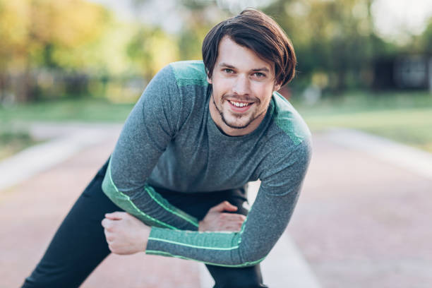 istock Sportsman exercising in the park 680169476