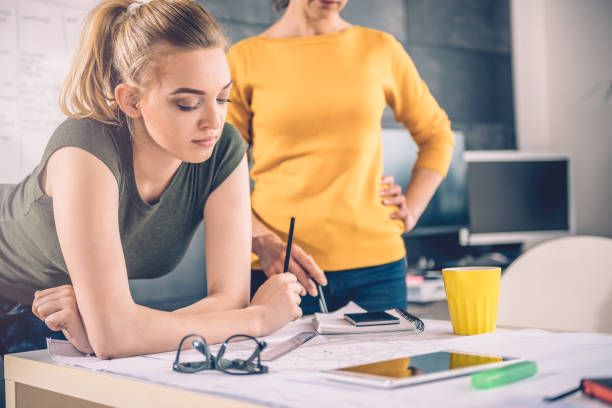 istock Two business woman contemplating 680176930