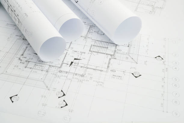 istock architectural drawing paper rolls of a dwelling for construction 680191638