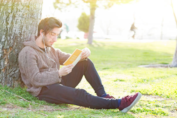 istock Enjoyment with book in nature 680191780